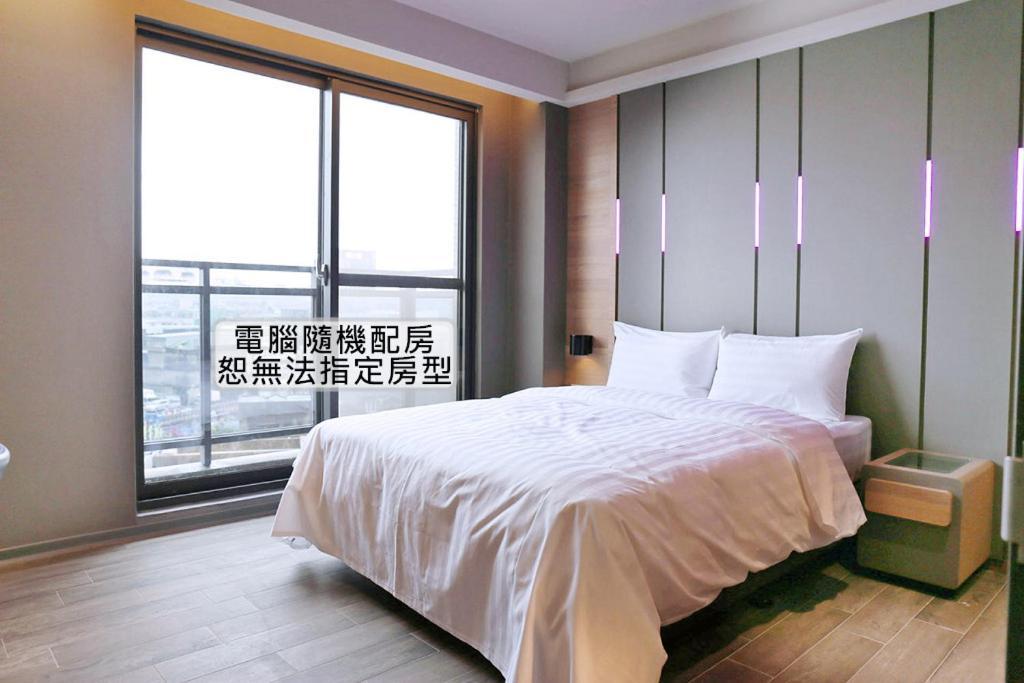 Kiwi Share Hotel Чжунли Екстериор снимка