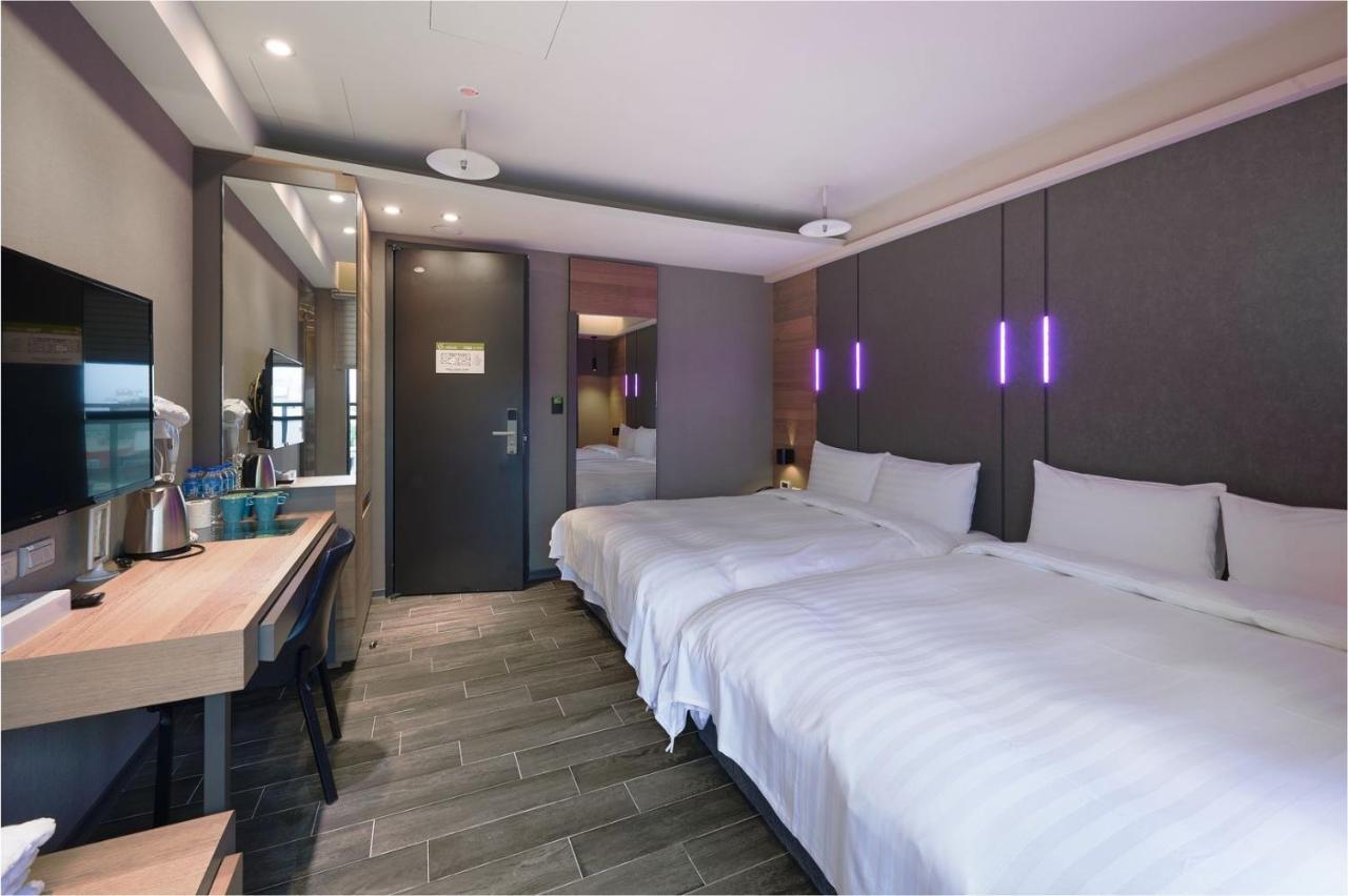 Kiwi Share Hotel Чжунли Екстериор снимка