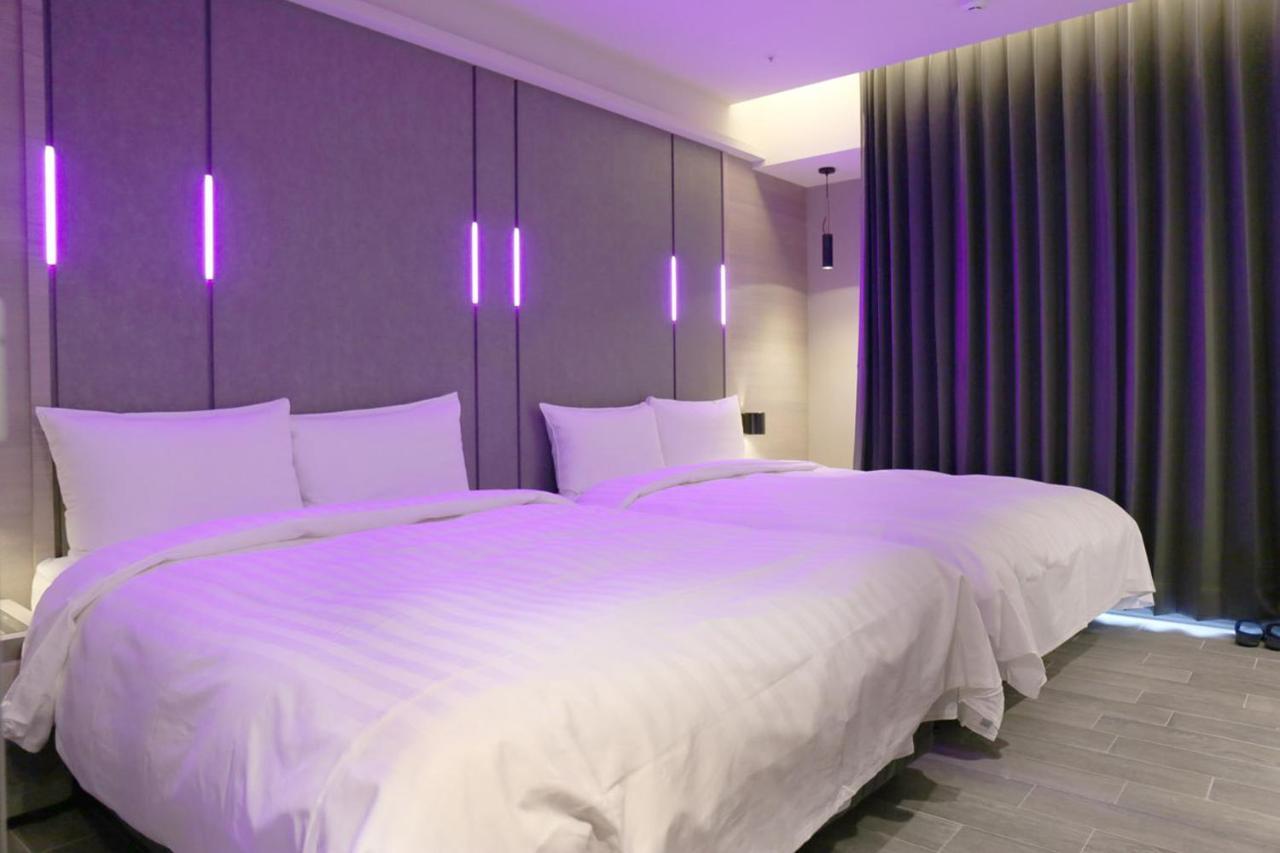 Kiwi Share Hotel Чжунли Екстериор снимка