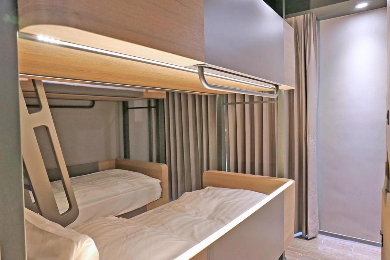 Kiwi Share Hotel Чжунли Екстериор снимка