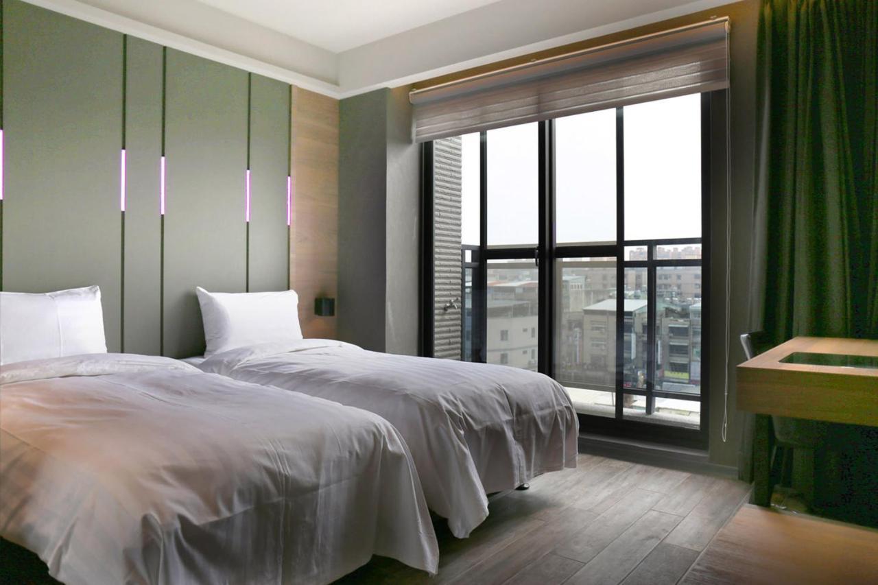 Kiwi Share Hotel Чжунли Екстериор снимка